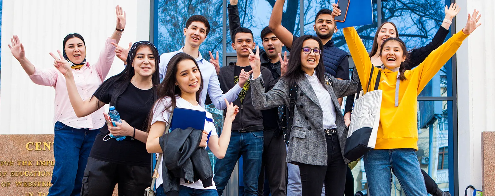 photo of students smiling and happy to be at Webster University